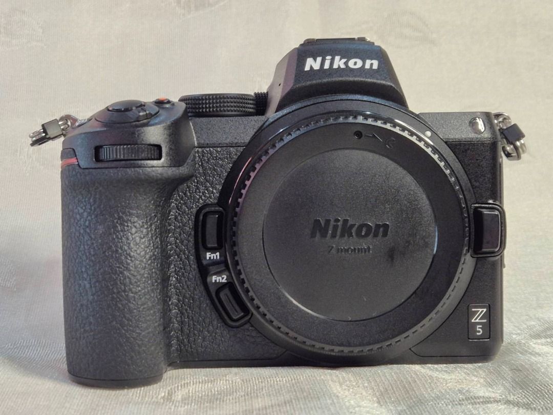 Nikon Z5 Mark 1 Mirrorless Body (6.5K Shutter Count) (Category: Cameras) located in Quezon City. Submitted by alxgen (Listing ID 1436263605, Image 1). Description: ITEM: Nikon Z5 Mark 1 Body SERIAL: 722xxxx PRICE: Php 43,000 👉 PACKAGE 👈 ✅ Nikon Z5 Mark 1 body ✅ Nikon EN-EL15c Battery ✅ Nikon MH-25a Charger ✅ Nikon Z Camera Strap 👉 CONDITION 👈 ✅ 6,5xx Shutter Count ✅ 100% Battery Health ✅ No Loose Rubbers ✅ 8.5/10 Physical Appearance ✅ No Vign