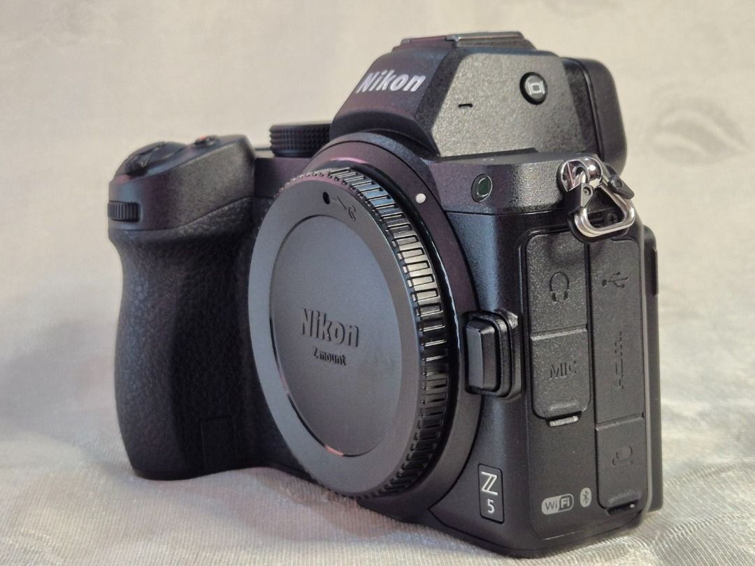 Nikon Z5 Mark 1 Mirrorless Body (6.5K Shutter Count) (Category: Cameras) located in Quezon City. Submitted by alxgen (Listing ID 1436263605, Image 3). Description: ITEM: Nikon Z5 Mark 1 Body SERIAL: 722xxxx PRICE: Php 43,000 👉 PACKAGE 👈 ✅ Nikon Z5 Mark 1 body ✅ Nikon EN-EL15c Battery ✅ Nikon MH-25a Charger ✅ Nikon Z Camera Strap 👉 CONDITION 👈 ✅ 6,5xx Shutter Count ✅ 100% Battery Health ✅ No Loose Rubbers ✅ 8.5/10 Physical Appearance ✅ No Vign