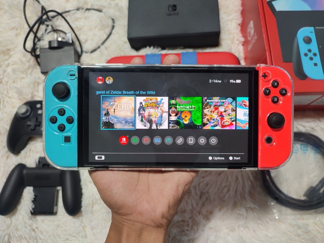 Nintendo Switch OLED Jailbreak (Category: Nintendo) located in Manila. Submitted by plsbuymyswitch.pls (Listing ID 1436174197, Image 2). Description: Nintendo Switch OLED ✅Permanent jailbreak dualboot ✅Complete accessories w/box and receipt ✅With wireless gamepad ✅With case and hard pouch ✅Tempered glass installed ✅No issue, less than a year old.