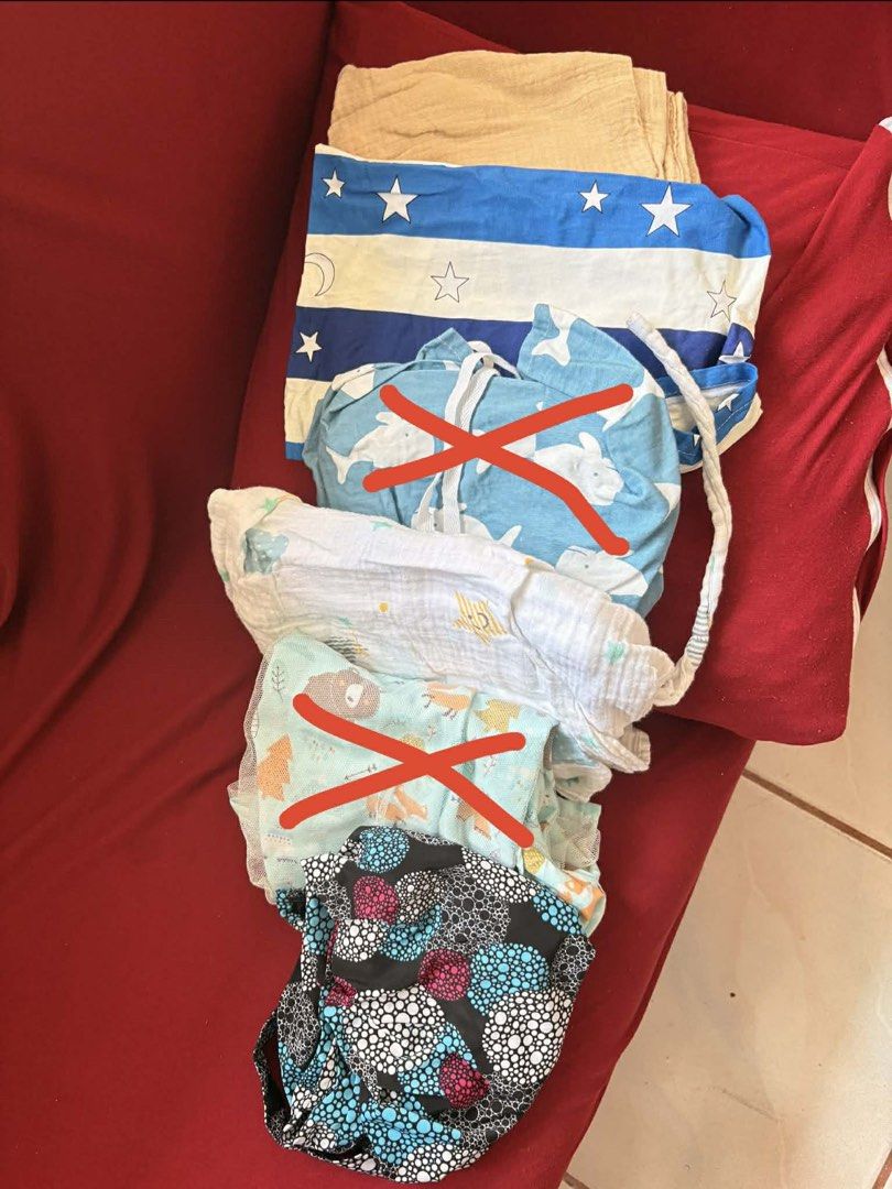 Nursing cover (Category: Maternity Care) located in Imus. Submitted by bpkarma (Listing ID 1436175457, Image 1). Description: - Includes: - Blue and white star patterned blanket - Beige cloth - Patterned diaper - Other items marked with 'X' are not included..