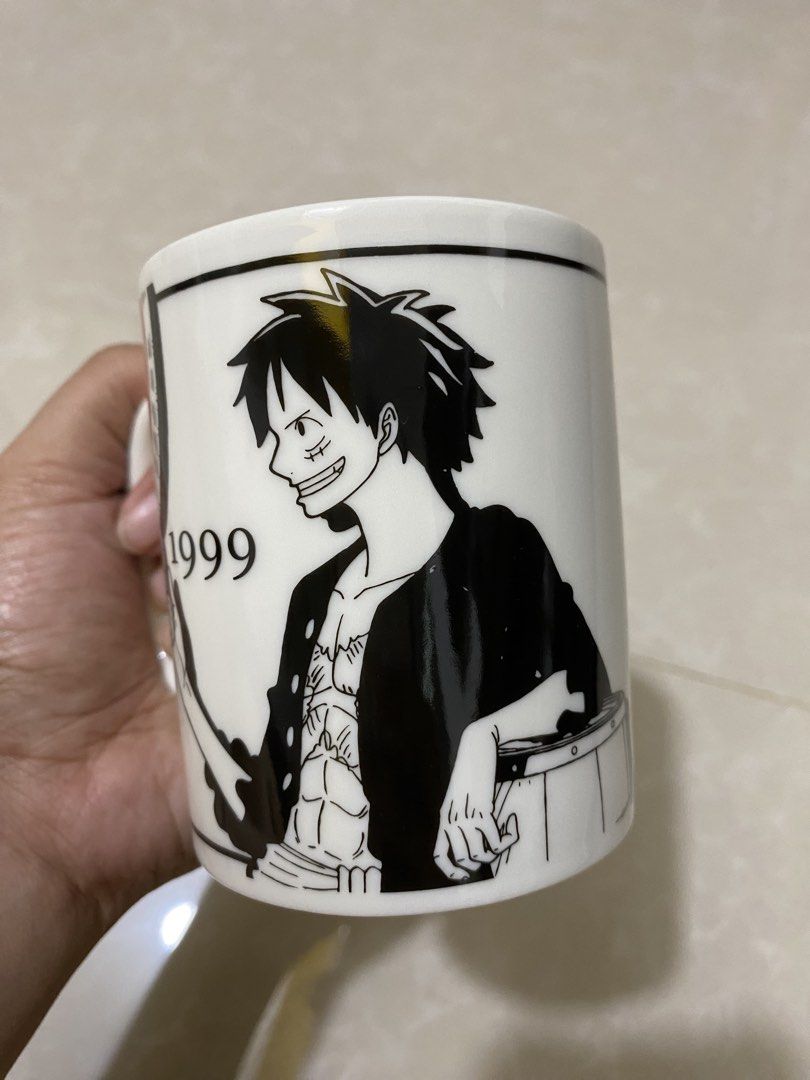 One Piece 20th Anniversary Mug (Category: Coffee & Tea Tableware) located in Makati City. Submitted by lasthing.22 (Listing ID 1436265452, Image 2). Description: Good as new. No issue. Collectible. MOP: Gcash/Bank Transfer MOD: Lalamove/J&T.
