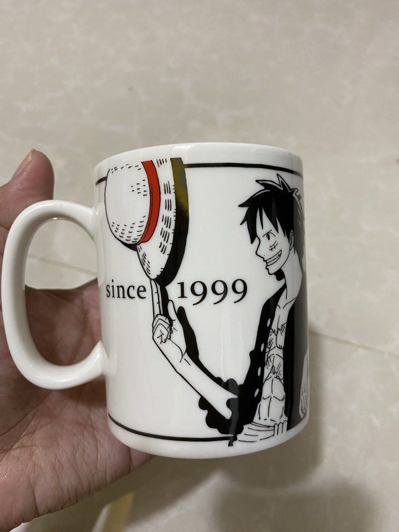 One Piece 20th Anniversary Mug (Category: Coffee & Tea Tableware) located in Makati City. Submitted by lasthing.22 (Listing ID 1436265452, Image 3). Description: Good as new. No issue. Collectible. MOP: Gcash/Bank Transfer MOD: Lalamove/J&T.