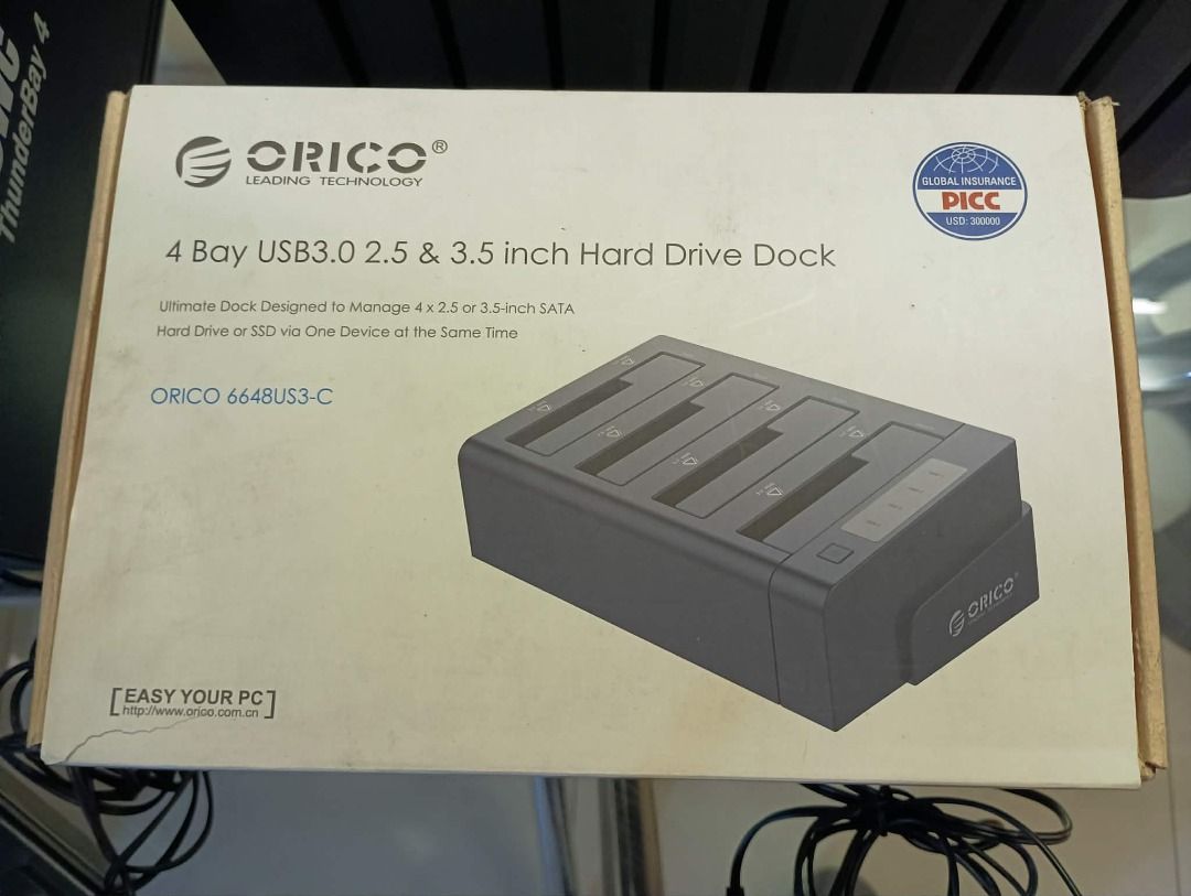 ORICO 4 Bay USB3.0 Hard Drive Dock (Category: Hard Disks & Thumbdrives) located in Caloocan City. Submitted by bg_geniusph (Listing ID 1436173983, Image 1). Description: ORICO 4 Bay USB3.0 hard drive dock for 2.5 and 3.5 inch hard drives. It allows you to manage up to four hard drives or SSDs simultaneously. The model number is 6648US3-C. It is designed for easy use with your PC. WITH BOX Asking price: 5,000 php .