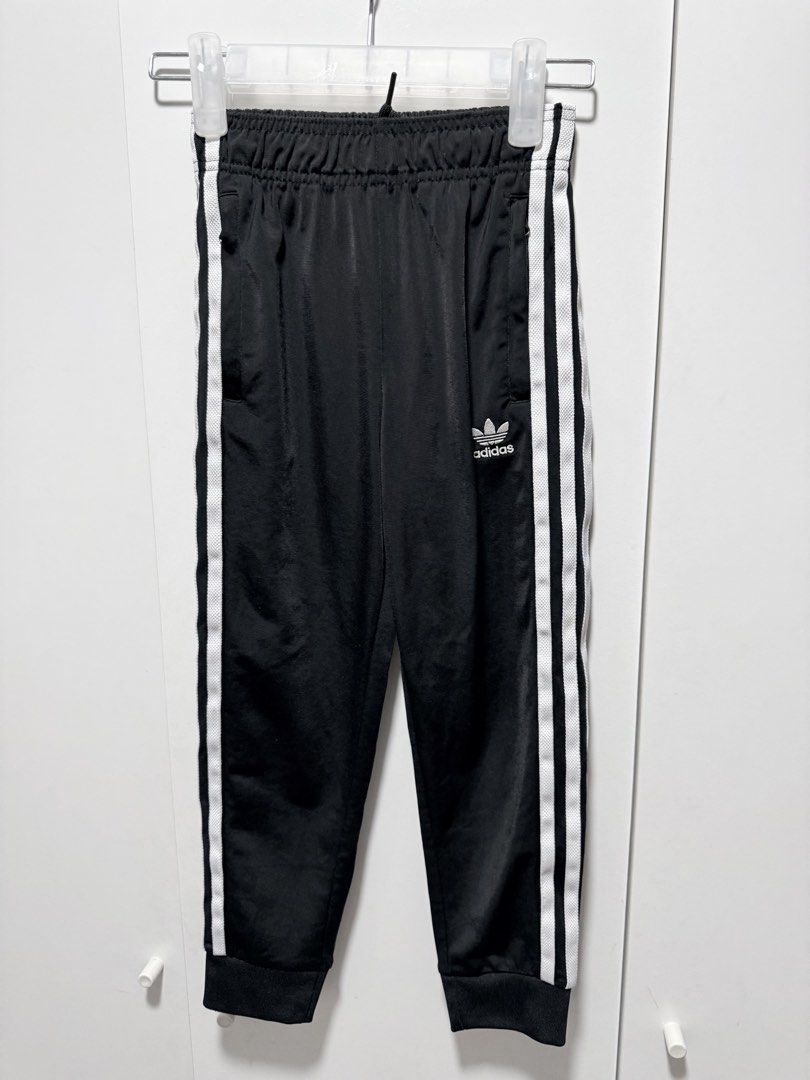 Original Adidas kids track suit (Category: Babies & Kids Fashion) located in Pasig City. Submitted by decluttery8 (Listing ID 1436167474, Image 3). Description: Twice used lang for out of the country travel.