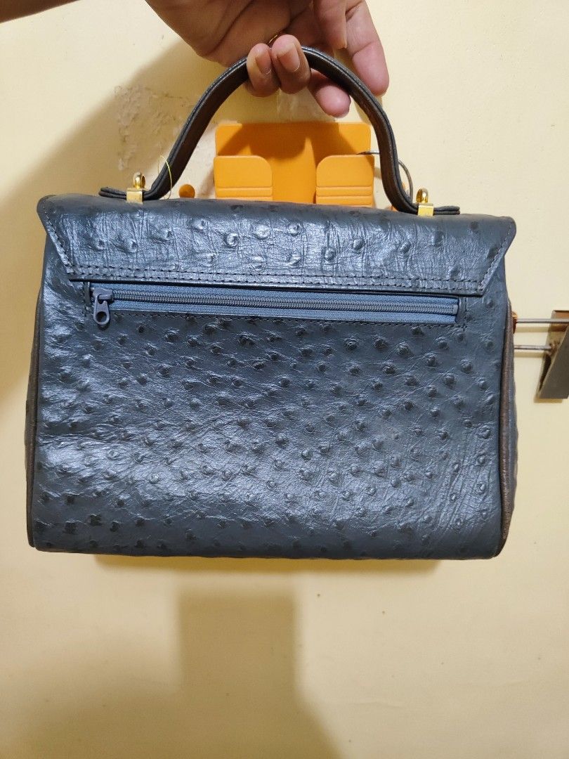 Ostritch Skin Hand Bag (Category: Luxury Bags & Wallets) located in Paniqui. Submitted by arlenepari29210 (Listing ID 1436259896, Image 2). Description: - Ostrich Skin Hand Bag - Classic design - Secure clasp closure - Comfortable handle - Unique texture - Perfect for everyday use or special occasions.