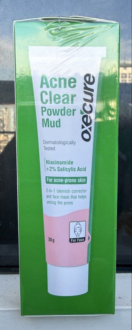 Oxe'cure Acne Clear Powder Mud 30g (Category: Face Care) located in Subic. Submitted by corncarts (Listing ID 1436213599, Image 2). Description: - Oxe'cure Acne Clear Powder Mud: 2-in-1 blemish corrector & face mask. - Contains Niacinamide & 2% Salicylic Acid. - Gently exfoliates to reduce pimple bumps. - Helps fade post-acne marks. - Controls excess oil. - Use as a face mask 2x a week for 6-12 hours..
