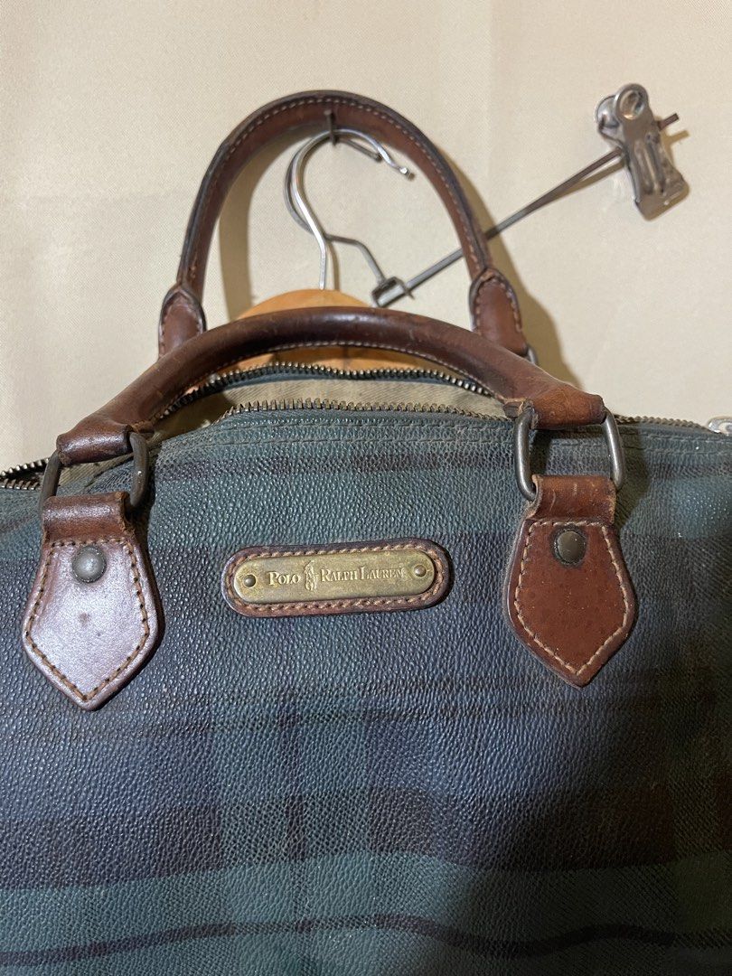 Polo Ralph Lauren Plaid Handbag (Category: Luxury Bags & Wallets) located in Manila. Submitted by certhrified_legit21 (Listing ID 1436165031, Image 1). Description: - Authentic Polo Ralph Lauren handbag - Features a plaid pattern in green and blue - Brown leather handles and accents - Secure zipper closure - Includes a small brass nameplate - Interior has a leather Polo Ralph Lauren tag.