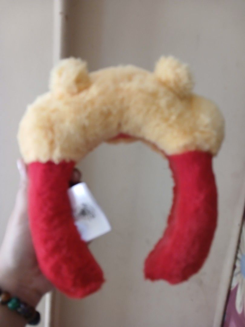 Pooh headband no nose (Category: Babies & Kids Fashion) located in Cebu City. Submitted by monsterheart (Listing ID 1436248141, Image 2). Description: - Pooh headband for girls. - Features a cute design. - Made of soft plush material. - Missing the nose. - Suitable for ages 4-12 years old..