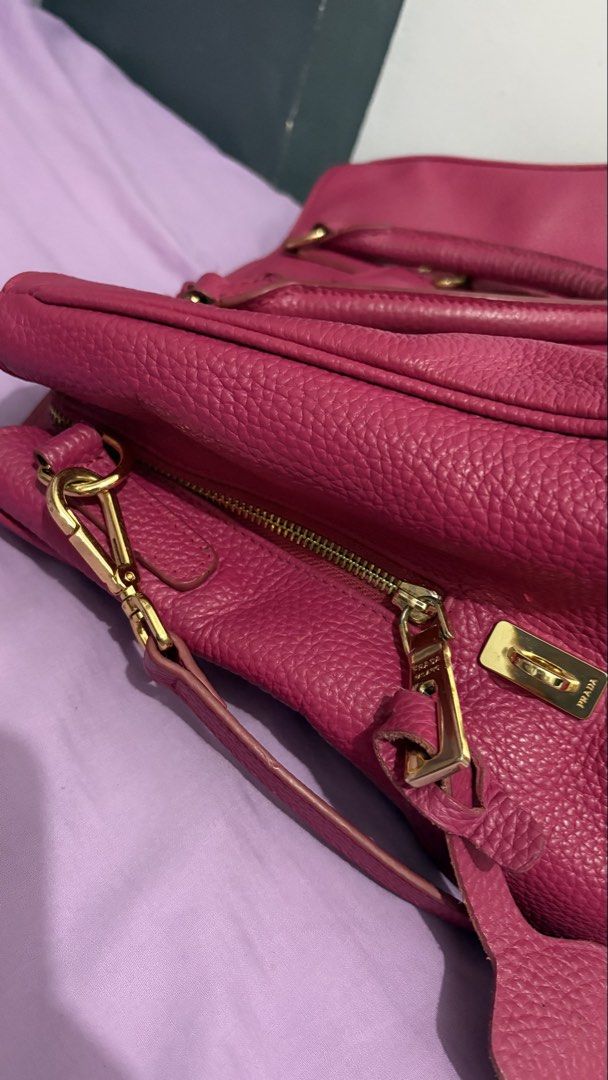 Prada Vitello Dino 2way Hand Bag (Category: Luxury Bags & Wallets) located in Los Banos. Submitted by luxxlady97 (Listing ID 1436261194, Image 3). Description: Overall in good used condition signs of usage but very minimal since this is gently used with care can do meet up in Cubao lalamove or LBC gcash or BPI.