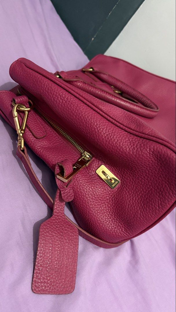 Prada Vitello Dino 2way Hand Bag (Category: Luxury Bags & Wallets) located in Los Banos. Submitted by luxxlady97 (Listing ID 1436261194, Image 2). Description: Overall in good used condition signs of usage but very minimal since this is gently used with care can do meet up in Cubao lalamove or LBC gcash or BPI.