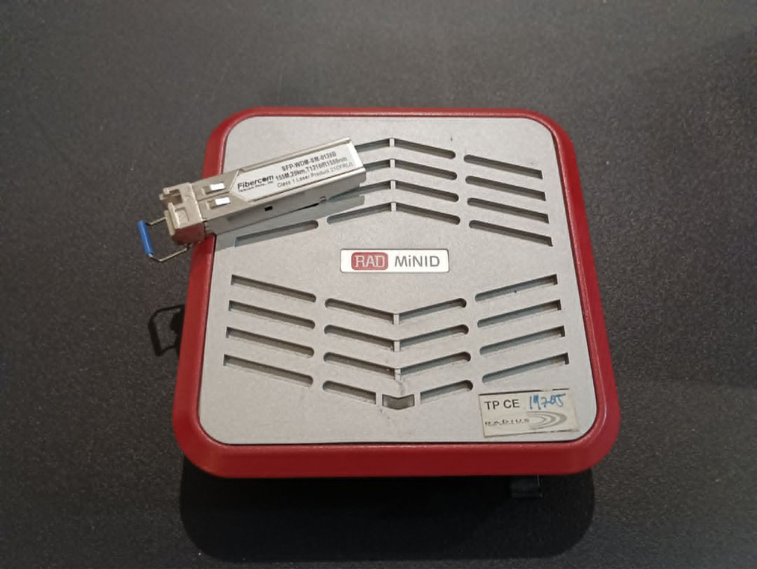 RAD MiniID with Fiber Optic Transceiver (Category: Networking) located in Caloocan City. Submitted by bg_geniusph (Listing ID 1436184942, Image 1). Description: RAD MiNID miniature programmable network interface device Asking price: 5,000 php - RAD MiniID network device (red and gray design) - Features ventilation slots - Fibercon transceiver model: VT-808-1S-V555.