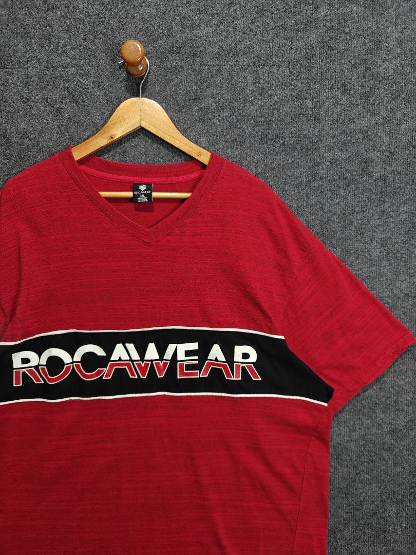 SALE ❗Rocawear Red V-Neck T-Shirt (Category: Tshirts & Polo Shirts ) located in Alaminos. Submitted by epargne (Listing ID 1436286070, Image 2). Description: 🏷️ Rocawear Condition: Vgood ! Color rate: 9.5/10 Size: XXL - XXXL Measurement: ⬇️⬇️⬇️ Length' 33 'Width' 26.5 Issue: Sunfade malapit sa armpit, see last photo bagong bago pa ito solid condition pa See picture for details ⬇️⬇️⬇️.