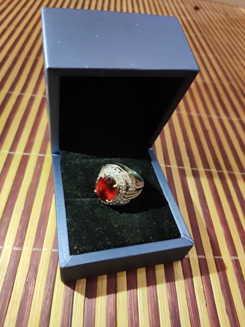 Ruby gemstone ring (Category: Precious Stones) located in Singapore. Submitted by onestopshopppp (Listing ID 1436231334, Image 2). Description: Silver No hallmark Treatment GF3 color pinkish Red Transparent Ruby With ID card.