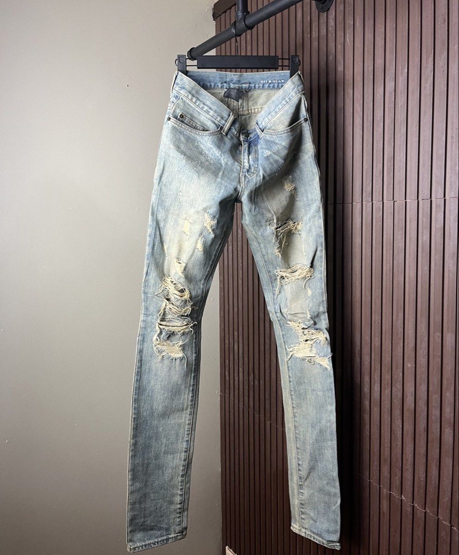 Saint Laurent Paris AW/14 Destroy Crashed Denim Pants (Category: Jeans) located in Cabanatuan. Submitted by cabsygoods (Listing ID 1436218876, Image 1). Description: Saint Laurent Paris AW/14 Destroy Crashed Denim Pants Waistline 29 Length 44 Very good condition No issue Color rate 9/10 Dm to purchase! 📩.