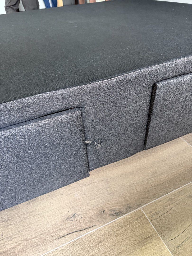 Salem Queen Size Bed Frame with Storage (Category: Bed Frames & Mattresses) located in Makati City. Submitted by inezlebron (Listing ID 1436228609, Image 3). Description: - Queen-size bed frame with storage - Dark grey fabric upholstery - Button-detailed headboard - Built-in storage drawers.