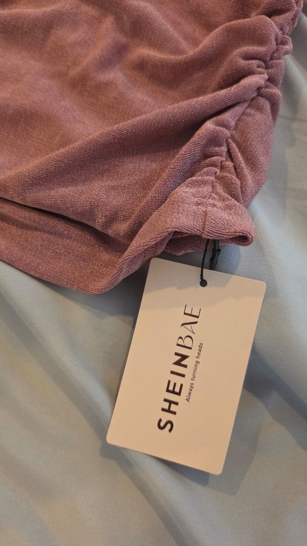 SHEIN Top + Skirt Set - Size S (Category: Dresses) located in Muntinlupa City. Submitted by mdoc.declutter (Listing ID 1436106888, Image 3). Description: SHEIN 2-Piece Set (Top + Skirt) – Dusty Rose 🌸 Size: S (fits XS–S) Condition: Brand new with tag • Soft stretch fabric • Ruched strapless top with floral detail (super flattering) • Matching high-waist midi skirt • Elegant, feminine, perfect for events / date nights Never worn RFS: Decluttering