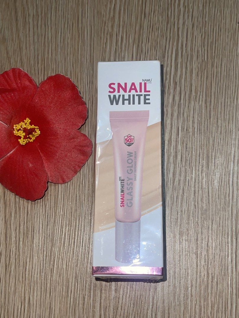 Snail White Glassy Glow Tinted Sunscreen (Category: Face Care) located in Caloocan City. Submitted by deejcortes (Listing ID 1436206314, Image 1). Description: Sealed. New and Never unboxed. Bought it from thailand. .