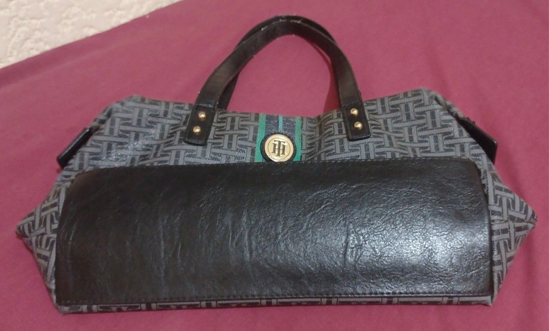 Tommy Hilfiger TH monogram tote bag, (Category: Luxury Bags & Wallets) located in Quezon City. Submitted by wjmae (Listing ID 1436151630, Image 3). Description: This Tommy Hilfiger TH monogram tote bag, featuring a central stripe and circular logo plaque, Note: ⚠️ minor issues seen on the last 2 images attached.