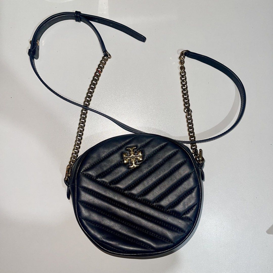 Tory Burch sling bag (Category: Shoulder Bags) located in Antipolo. Submitted by hatd0gger (Listing ID 1436222343, Image 1). Description: Pre-loved Tory Burch sling bag Price: 4k (negotiable) 🔹Round Sling bag in black color 🔹Nice in actual 🔹Gold hardware still shiny (most not tarnished) 🔹Dimensions: length (7 inches), width (bottom - 2.5 inches) 🔹With free half transparent generic dust bag RFS: Decluttering .