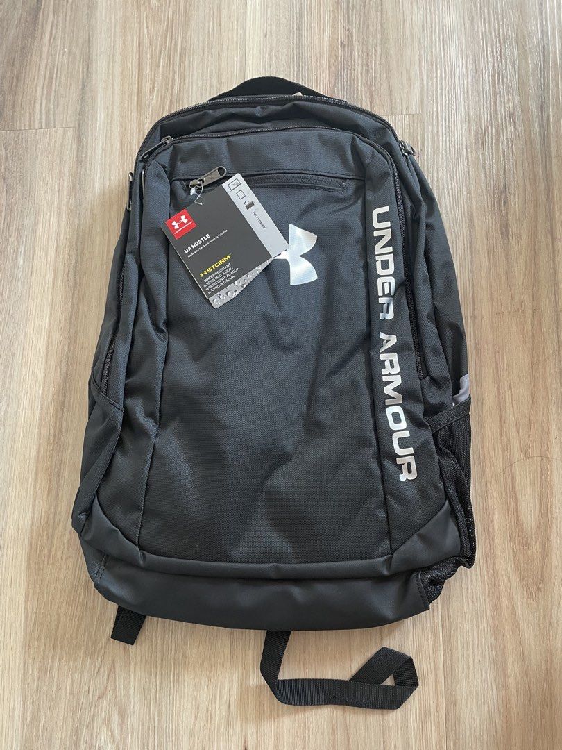 Under Armour UA Hustle Backpack 24L (Category: Backpacks) located in San Juan City. Submitted by prelovedhomegoods_ (Listing ID 1436166800, Image 1). Description: - Brand new Under Armour UA Hustle backpack - 24 L, 18” x 12” x 8” - With padded laptop compartment - Never used, still in original packaging .