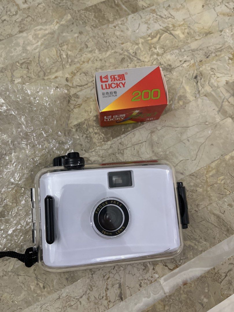 camera (Category: Cameras) located in Singapore. Submitted by daffytlh (Listing ID 1436202446, Image 1). Description: Camera for sale Honestly i dint know what camera this is. Maybe is under water or disposable camera. Someone gave me recently i dont use Film not available .