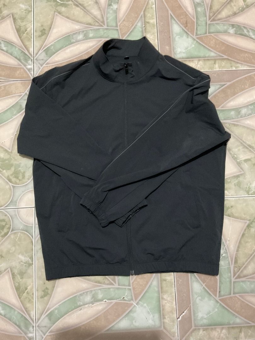 Uniqlo active track jacket (Category: Activewear) located in Caloocan City. Submitted by jrrrrr1 (Listing ID 1436190349, Image 1). Description: - Uniqlo active track jacket - Dark color - Full zip closure - Lightweight material.