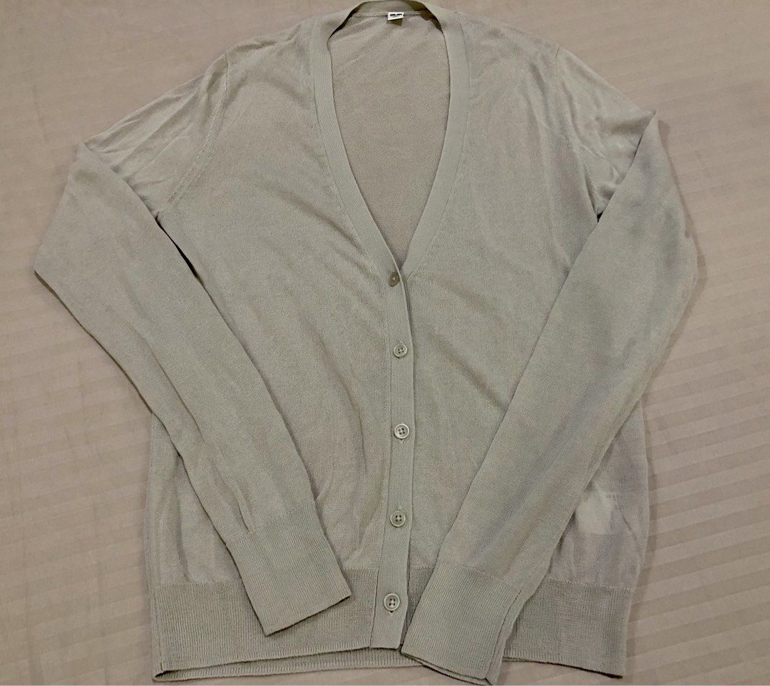 Uniqlo Light V Neck Cardigan (Category: Coats, Jackets and Outerwear) located in Quezon City. Submitted by sheisdecluttering_now (Listing ID 1436172356, Image 1). Description: .