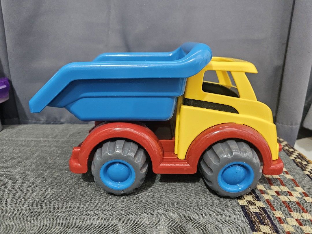 Viking Toys Dump Truck (Category: Kids Toys) located in Quezon City. Submitted by kcphilippines (Listing ID 1436121388, Image 3). Description: - Colorful Viking Toys dump truck - Features a blue dump bed, yellow cab, and red accents - Gray wheels with blue centers - Made of durable plastic - Safe, rounded edges - Suitable for indoor and outdoor play Kindly check photos or pm me for more details please. Shipping is not yet included in the price. W