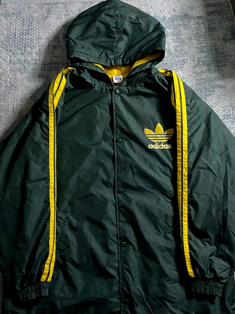 Vintage Adidas Big Logo Coach Jacket (Category: Coats, Jackets and Outerwear) located in Paranaque City. Submitted by anywear.ph_ (Listing ID 1436145096, Image 1). Description: Adidas Big Logo Coach Jacket Adidas x Descente Good Condition Sherpa fabric inside Dimes: 26 ½ x 34 ½ Issue : check last picture.