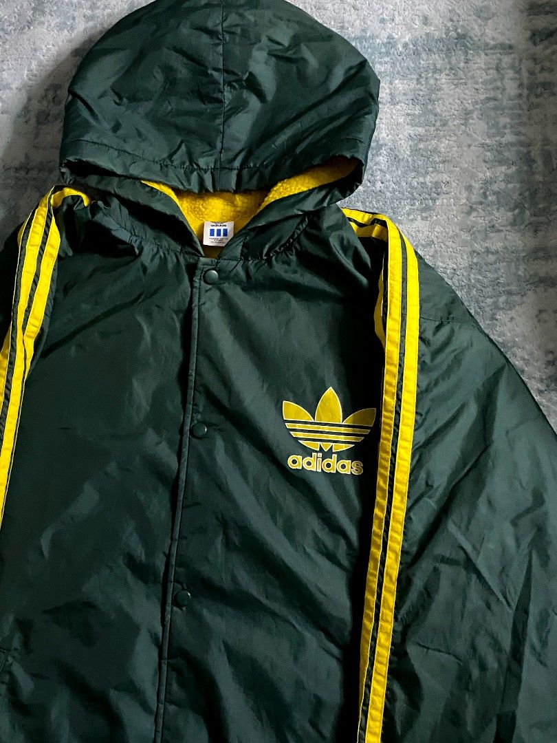 Vintage Adidas Big Logo Coach Jacket (Category: Coats, Jackets and Outerwear) located in Paranaque City. Submitted by anywear.ph_ (Listing ID 1436145096, Image 3). Description: Adidas Big Logo Coach Jacket Adidas x Descente Good Condition Sherpa fabric inside Dimes: 26 ½ x 34 ½ Issue : check last picture.