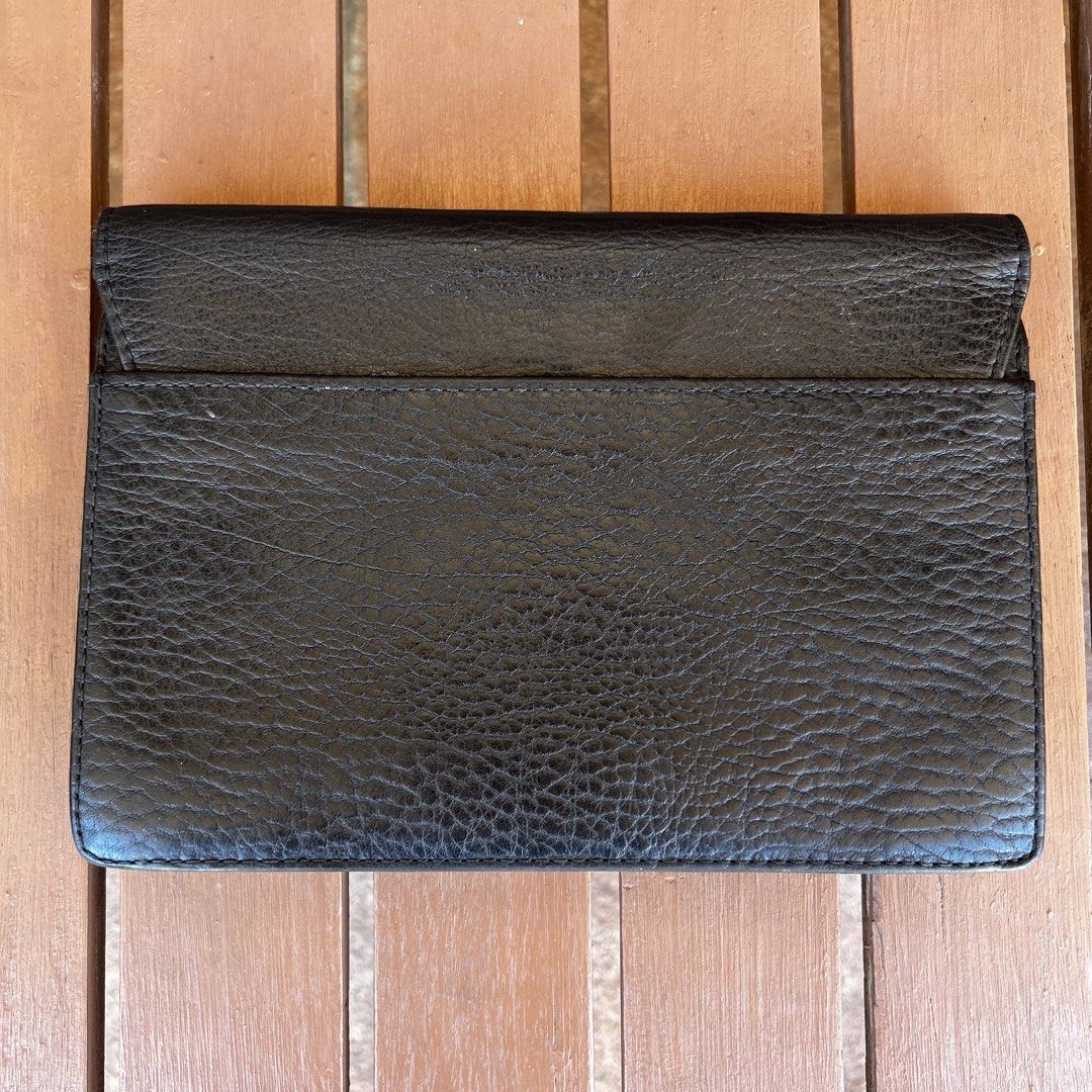 Vintage Burberry Clutch Bag Leather Authentic (Category: Luxury Bags & Wallets) located in Las Pinas. Submitted by _dontlikejustbuy (Listing ID 1436156295, Image 3). Description: Color: Leather Black Dimensions: - Height 17cm - Width 25cm - Depth 7cm - Strap 34cm Issues: Signs of usage. Stains on flap. .