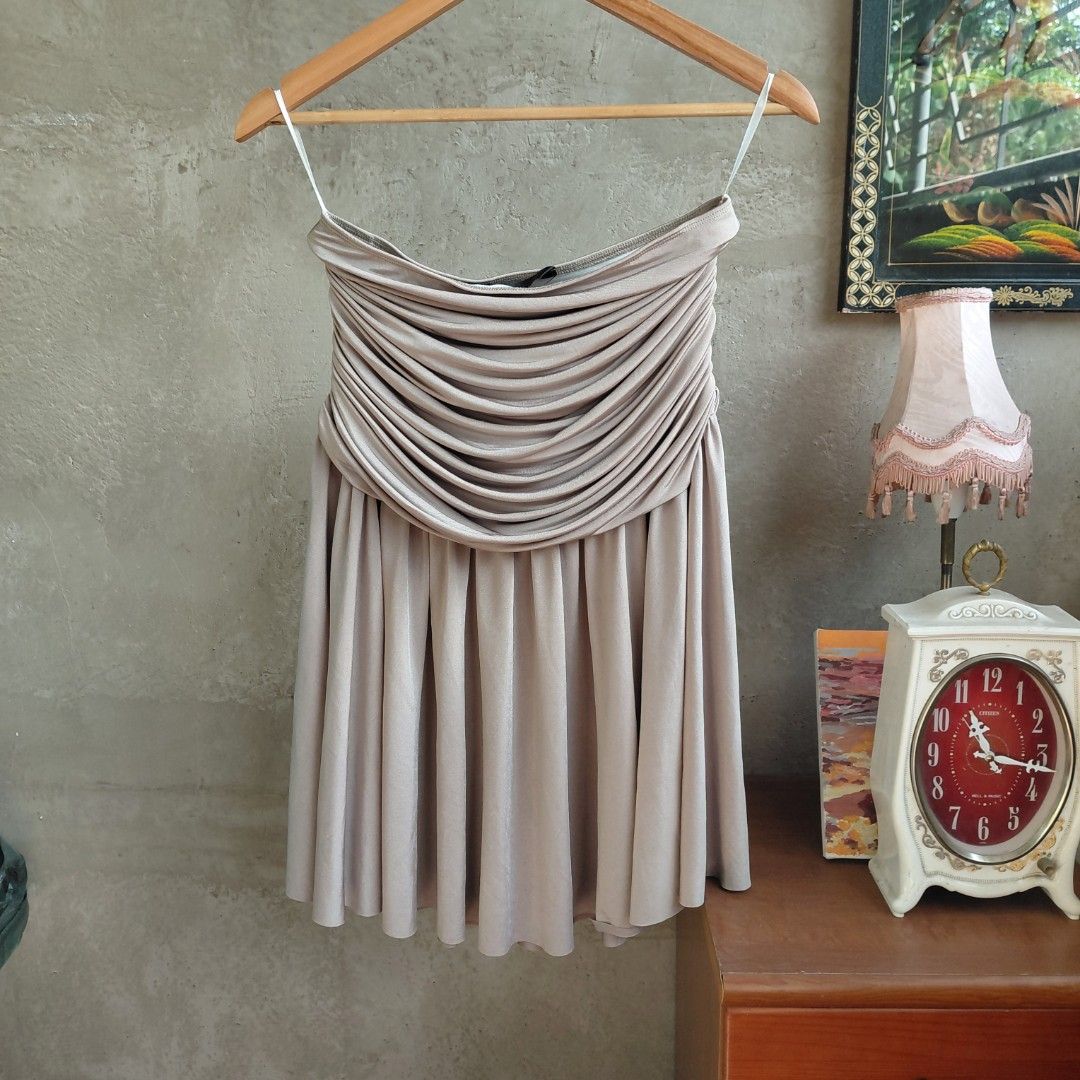 Vintage Eclipse Skirt (Category: Dresses) located in Koronadal. Submitted by shetries (Listing ID 1436199387, Image 2). Description: - Eclipse strapless dress - Features a ruched bodice - Flowing skirt design - Neutral color - versatile for many occasions - Includes a white elastic band inside - Perfect for special events and nights out.