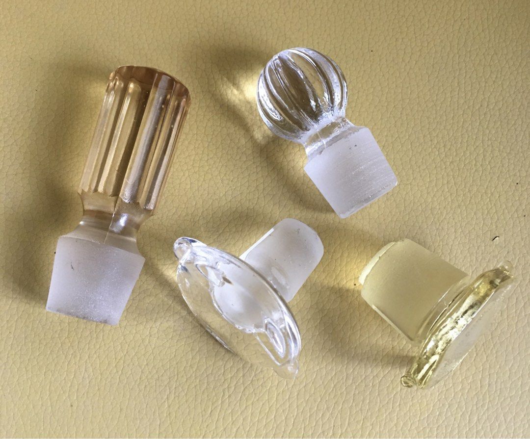 Vintage Glass Decanter Stoppers (Category: Looking For) located in Tarlac. Submitted by greatfindstrlc (Listing ID 1436163481, Image 1). Description: 4 pcs. Different designs, colors and cork fittings to match specific decanter style. 2 pcs. with chip damage due to its prime age, refer to pic..