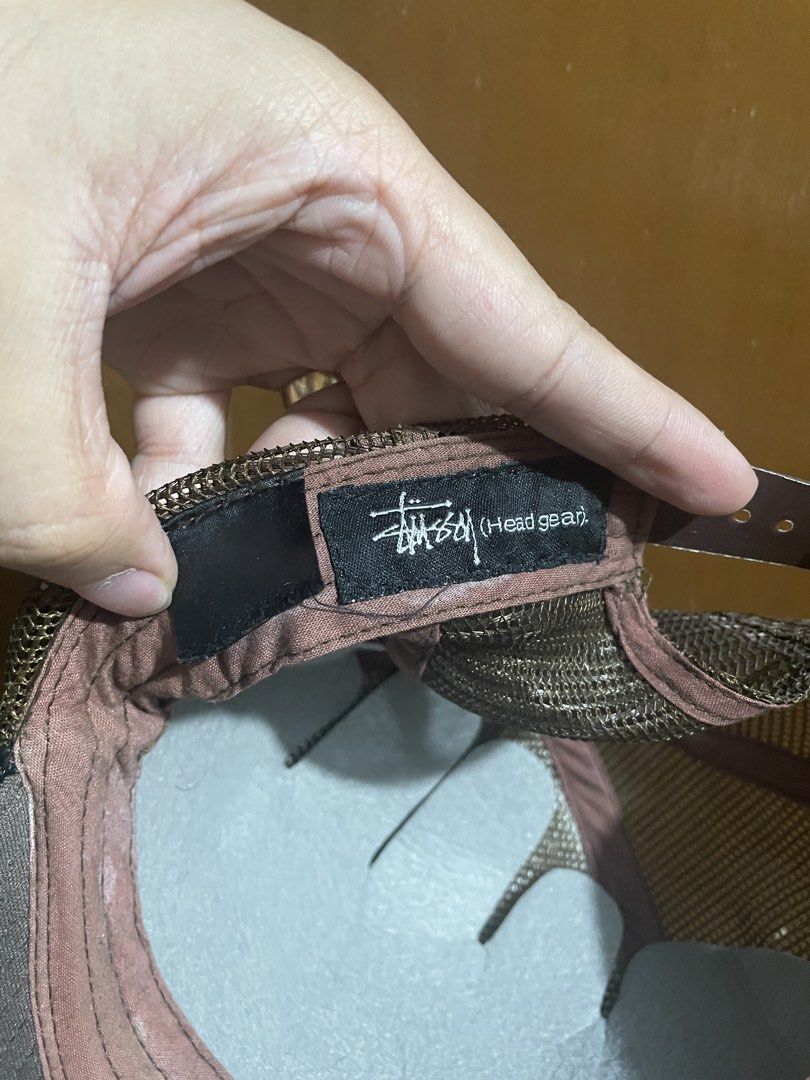 Vintage Stussy Trucker Cap (Category: Caps & Hats) located in Caloocan City. Submitted by LeGoat06 (Listing ID 1436273528, Image 3). Description: - Stussy trucker cap - Brown brim and mesh back - Colorful Stussy logo on front - Adjustable strap - Includes Stussy headgear tag -10/10 Condition -Need wash only.