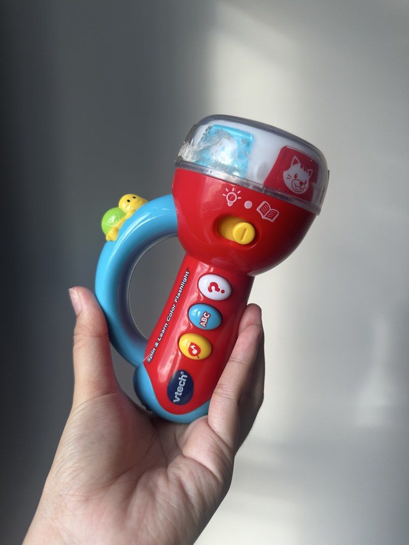 VTech Spin and Learn Color Flashlight Toy (Category: Educational & Learning Toys) located in Taguig. Submitted by declutzy (Listing ID 1436186809, Image 1). Description: Working with battery included Lights and sounds working well English Language All buttons are working.