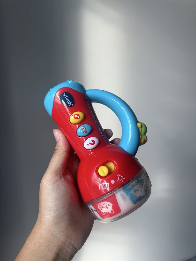 VTech Spin and Learn Color Flashlight Toy (Category: Educational & Learning Toys) located in Taguig. Submitted by declutzy (Listing ID 1436186809, Image 2). Description: Working with battery included Lights and sounds working well English Language All buttons are working.