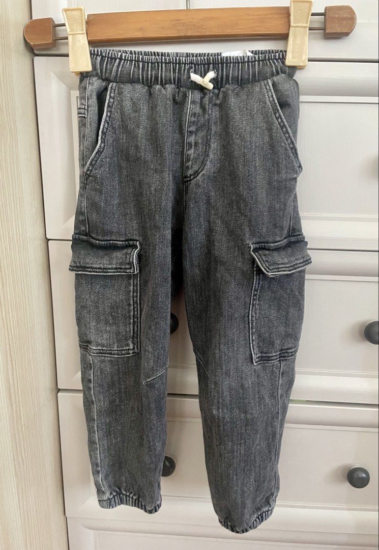 Zara Kids Cargo Pants - Size 5 (Category: Babies & Kids Fashion) located in Manila. Submitted by sustainable_thrift_mnl (Listing ID 1436143492, Image 1). Description: Zara Kids black denim cargo pants, elastic waistband, drawstring, two front pockets, two cargo pockets RFS: Decluttering Size: 110cm, 5 years old PSA: Actual color may slightly differ from what is shown on the screen due to photographic lighting and your screen settings..