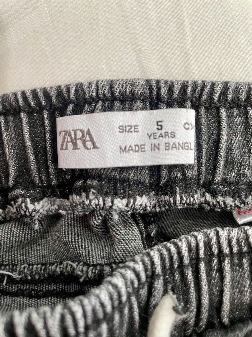 Zara Kids Cargo Pants - Size 5 (Category: Babies & Kids Fashion) located in Manila. Submitted by sustainable_thrift_mnl (Listing ID 1436143492, Image 2). Description: Zara Kids black denim cargo pants, elastic waistband, drawstring, two front pockets, two cargo pockets RFS: Decluttering Size: 110cm, 5 years old PSA: Actual color may slightly differ from what is shown on the screen due to photographic lighting and your screen settings..