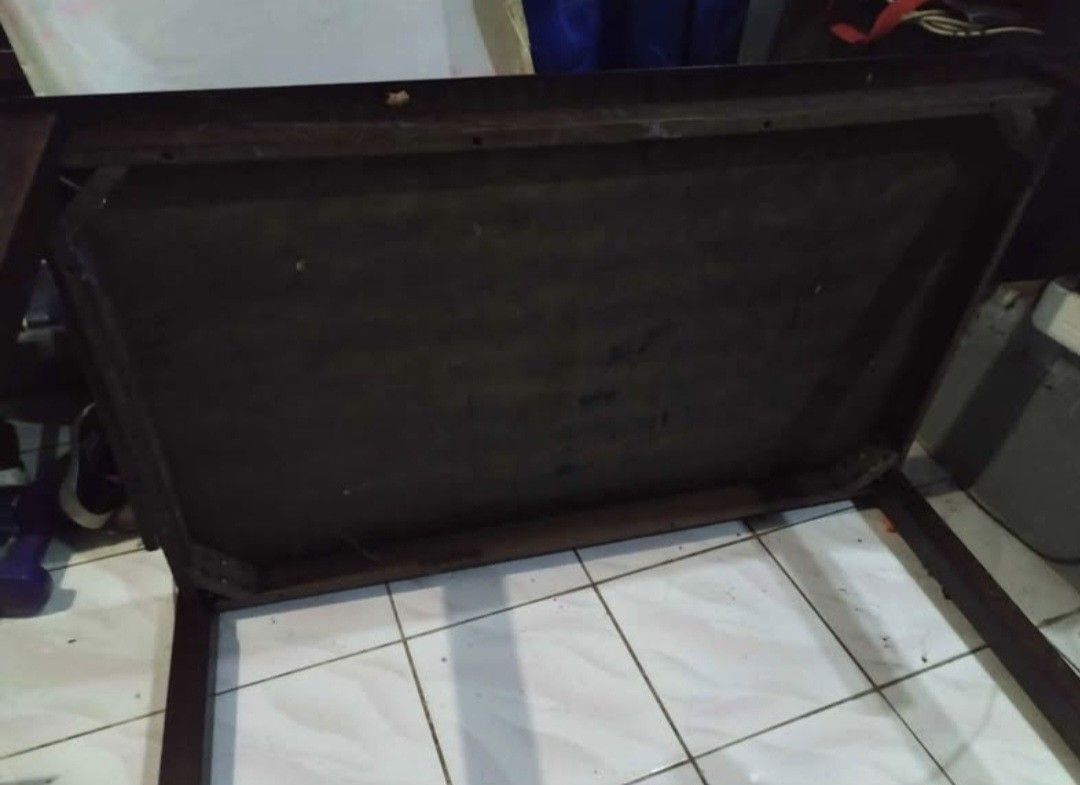 6 Seaters Dining Table with 4 Chairs and Tempered Glass (Category: Tables & Sets) located in Manila. Submitted by annebeng998800 (Listing ID 1436465805, Image 1). Description: - Dark brown wooden table - Includes tabletop and four legs - Assembly screws included - Sturdy and stable design - Suitable for various uses.