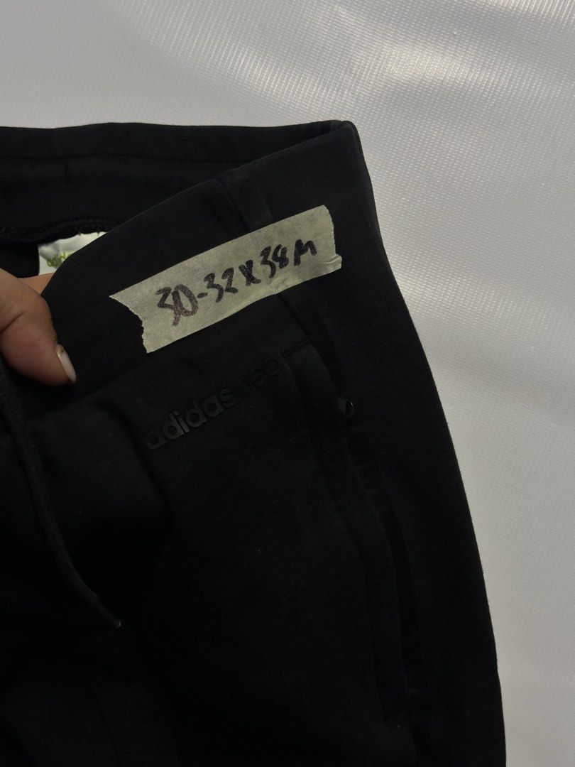 Adidas Neo Black Jogger Pants (Category: Joggers) located in Manila. Submitted by johnedel_james (Listing ID 1436431790, Image 3). Description: - Adidas Neo jogger pants - Color: Black with white stripes - Features: Drawstring waist, zippered side pockets - Size: 30-32 x 38M - Fit: Slim - Made in China.