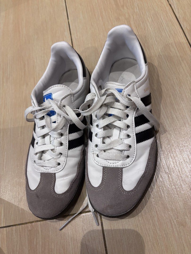 Adidas Samba White Black Sneakers (Category: Sneakers) located in General Trias. Submitted by irncstnd (Listing ID 1436387023, Image 1). Description: - Adidas Samba - White with black stripes - Grey toe cap - Size: US 6.5, UK 5, FR 38, JP 235, CHN 230 - Blue Adidas logo on tongue - Made in Vietnam - Model: B75886 Wala na pong box naitapon na. MOP: Gcash/Bank Transfer Sf shoulder by the buyer..