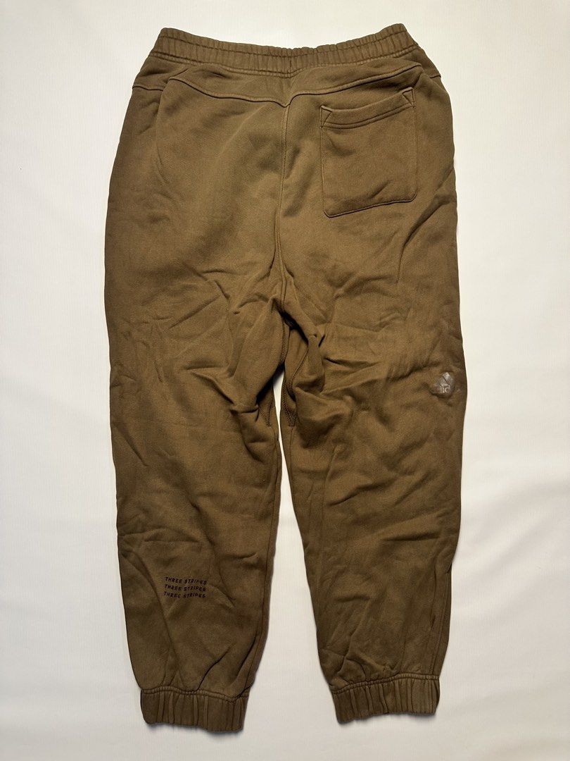Adidas Sportswear Sweatpants (Category: Joggers) located in Manila. Submitted by johnedel_james (Listing ID 1436430257, Image 2). Description: - Adidas Sportswear sweatpants - Color: Brown - Features Adidas logo and branding - Side pockets - Elastic cuffs - Back pocket - "Three Stripes" branding on lower leg - Made in China.