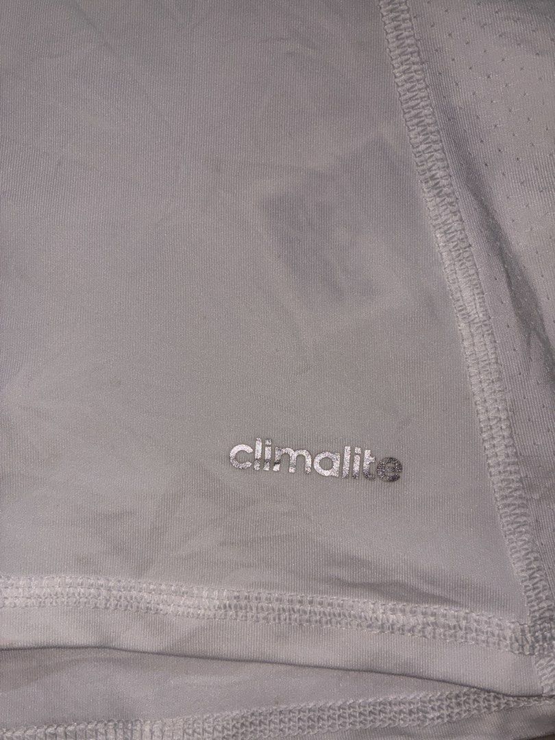 Adidas Techfit Sleeveless Shirt (Category: Activewear) located in Placer. Submitted by talaalond61563 (Listing ID 1436411780, Image 2). Description: - Adidas Techfit sleeveless shirt - White color - Crew neck - Adidas logo on shoulder - Climalite logo at the bottom - Compression shirt - Size 100 - Made in the Philippines.