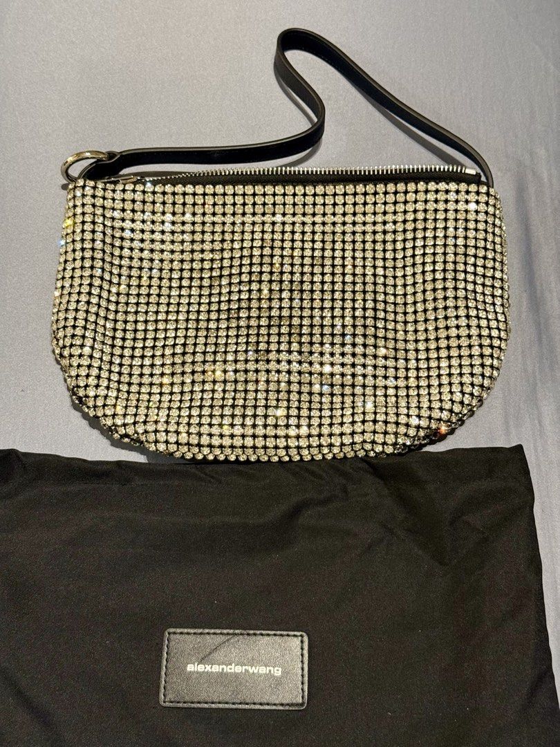 Alexander Wang Rhinestone Bag (Category: Luxury Bags & Wallets) located in Mandaluyong City. Submitted by mau62891 (Listing ID 1436384037, Image 1). Description: - Authentic Alexander Wang rhinestone handbag - Black leather strap - Zipper closure - Includes original black dust bag with Alexander Wang logo .