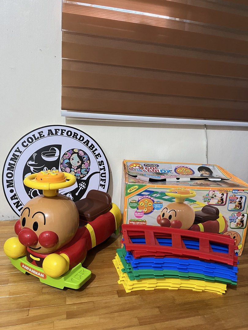 Anpanman Rail de Go manual train (Category: Kids Toys) located in Santa Rosa. Submitted by mommy.cole.affordable.stuff (Listing ID 1436296273, Image 2). Description: - Anpanman Rail de Go! DX train set - Includes train, tracks, and accessories - Features an Anpanman-themed ride-on train - Train has a steering wheel and buttons - Comes with the original box.