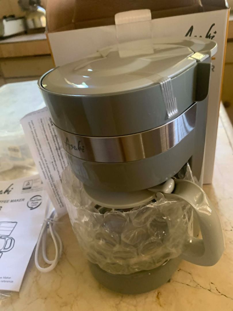 Asahi CM-052 Coffee Maker (Category: Coffee Machines & Makers) located in Muntinlupa City. Submitted by aubreyraven (Listing ID 1436346173, Image 3). Description: - Asahi CM-052 Coffee Maker - 6-cup (0.65L) capacity - Anti-drip valve - Permanent filter with handle - Auto-keep warm function - 230V~, 50Hz, 600 watts - Includes original box and instruction manual Brand New Orig Price: 2,450 .