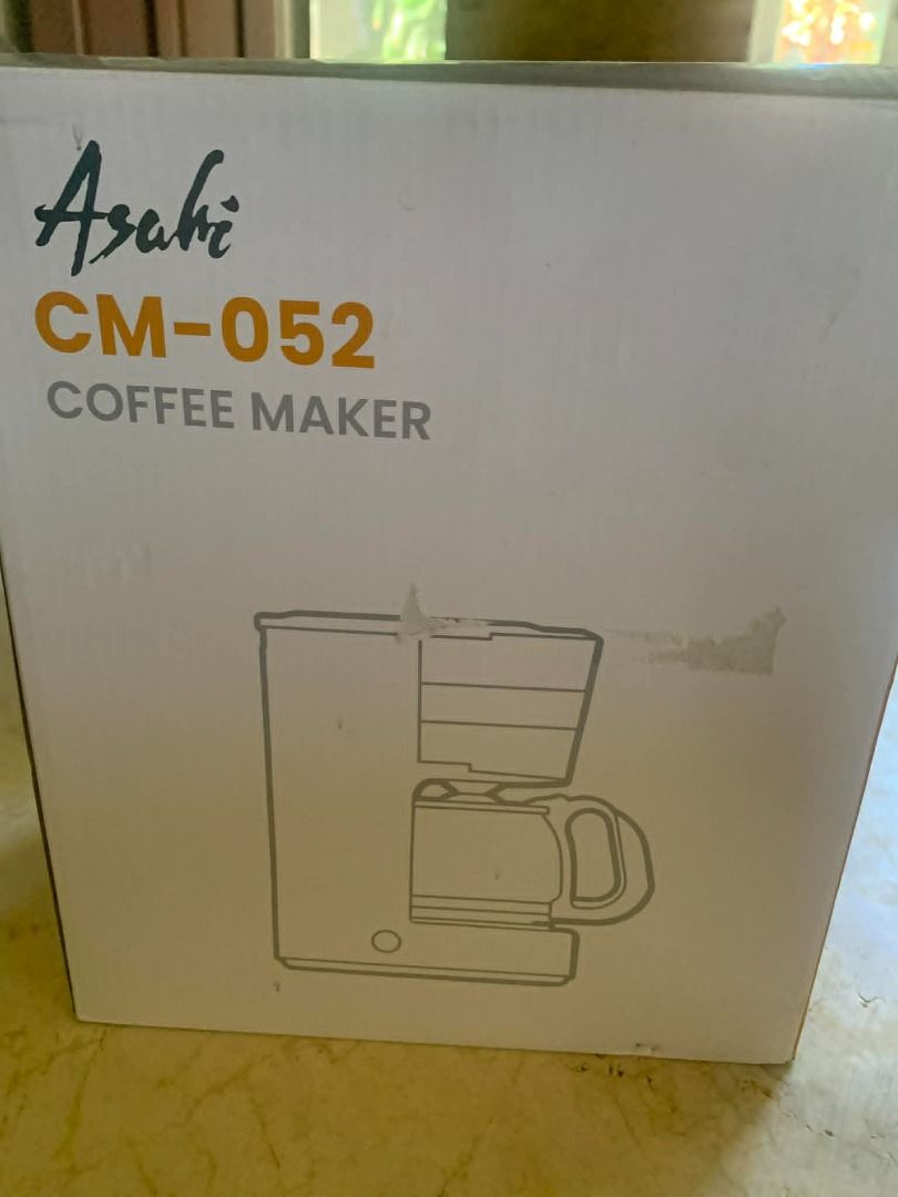 Asahi CM-052 Coffee Maker (Category: Coffee Machines & Makers) located in Muntinlupa City. Submitted by aubreyraven (Listing ID 1436346173, Image 2). Description: - Asahi CM-052 Coffee Maker - 6-cup (0.65L) capacity - Anti-drip valve - Permanent filter with handle - Auto-keep warm function - 230V~, 50Hz, 600 watts - Includes original box and instruction manual Brand New Orig Price: 2,450 .