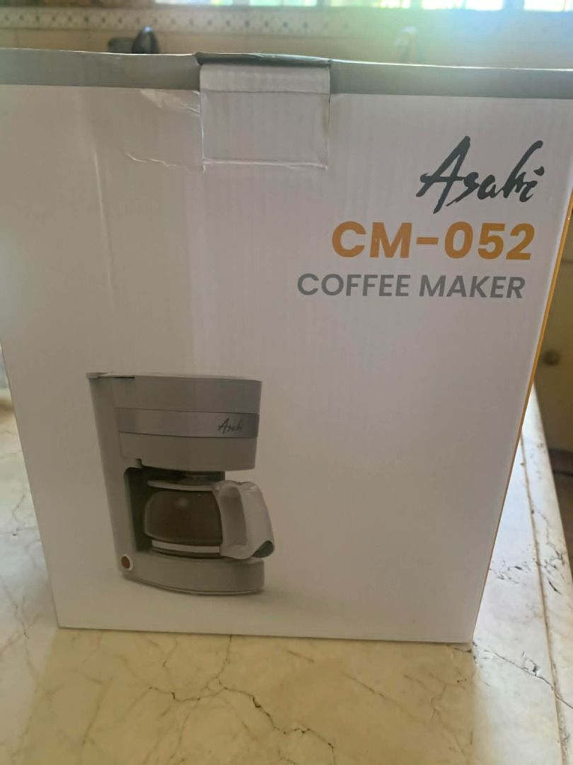 Asahi CM-052 Coffee Maker (Category: Coffee Machines & Makers) located in Muntinlupa City. Submitted by aubreyraven (Listing ID 1436346173, Image 1). Description: - Asahi CM-052 Coffee Maker - 6-cup (0.65L) capacity - Anti-drip valve - Permanent filter with handle - Auto-keep warm function - 230V~, 50Hz, 600 watts - Includes original box and instruction manual Brand New Orig Price: 2,450 .