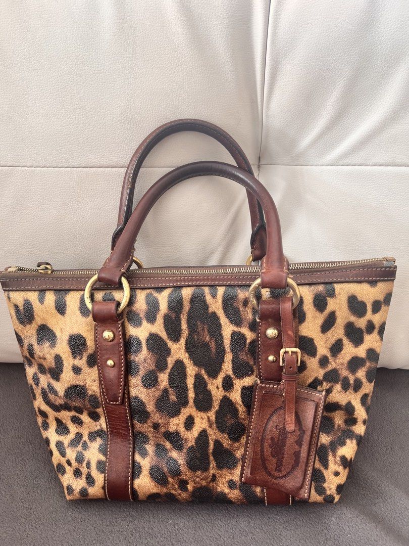Authentic Dolce & Gabbana Leopard Leather Bag (Category: Luxury Bags & Wallets) located in Bacoor. Submitted by clothestodeclutter (Listing ID 1436296166, Image 1). Description: - Brand: [Dolce & Gabanna] - Color: [Brown/Leopard Prints] - Stylish design - Durable material (Made with leather).
