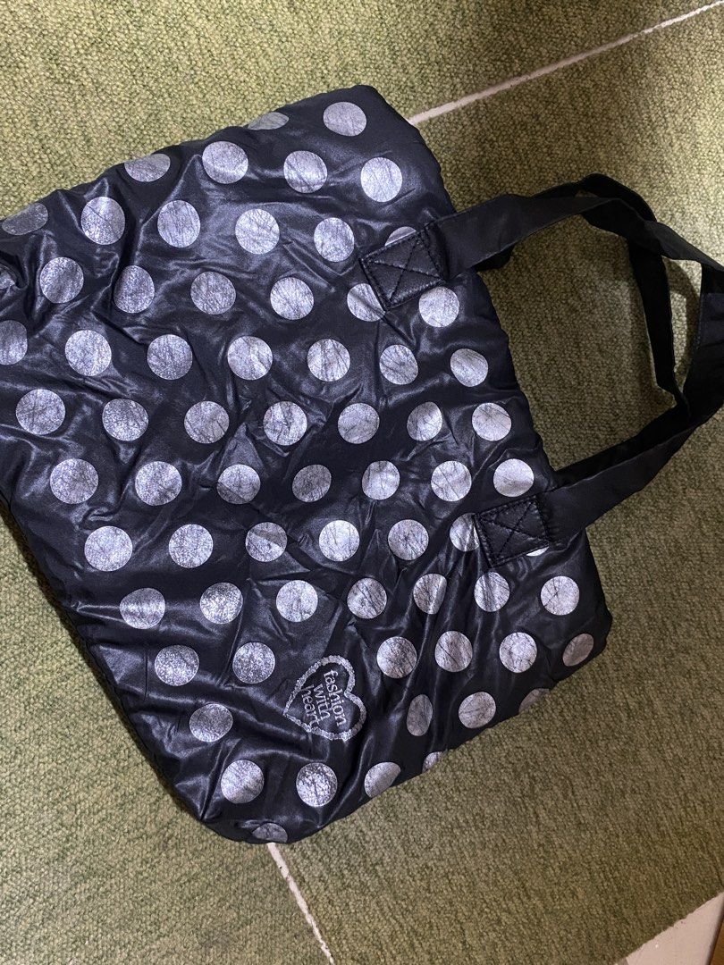 Black and Silver Polka Dot Bag Bubble bag (Category: Tote Bags) located in Manila. Submitted by faerikhae (Listing ID 1436440512, Image 1). Description: - Black tote bag short handle - Silver polka dot design - Two handles - Magnetic snap closure - Black interior - Small logo detail - Shiny, possibly nylon-like material.